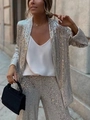 Close-up of sparkling silver sequin blazer and high-waist pants on a fashion model - S / Silver Pants