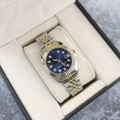 Close-up of two-tone luxury steel watch with blue dial and diamond markers in a gift box - Two-tone Dark Blue