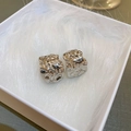 Irregular silver C-shape earrings with textured metal finish on white feathers in a gift box - 6# Silver Needle Irregular Pleated C-Shape Studs