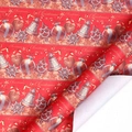 Red Christmas wrapping paper roll with festive gold bells, snowflakes and tree patterns - Joyful Bells