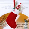 Red knitted Christmas stocking featuring letter A embroidery and a white folded cuff - Letter A / Red