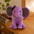 Cute purple plush elephant toy for baby with black bow and soft sitting pose - Purple/Black Bow