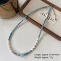 Tiger eye beaded necklace with blue natural stones and pearls on a vintage wooden tray - Aquamarine Necklace XL0746