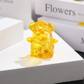 Amber glass sheep zodiac ornament with intricate scale textures on a white pedestal - Zodiac Sheep / Gold Yellow