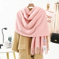 Thick pink cashmere blend scarf with fringe hanging on an autumn coat and hanger - Bulky Yarn Style / 200x70cm / Pink