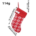 Calza di Natale rossa in maglia con motivi a fiocco di neve e pompon bianchi - Stile Fiocco di Neve