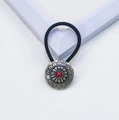 Western cowboy style hair tie with engraved silver floral motif and central red bead - Flower-Red