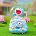 Blue Doraemon snow globe with pink cherry blossoms on a 3D cloud-shaped base - Medium 80 Light Snow + Light / Blue Doraemon (2424 Blue Base)