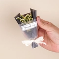 Close-up of mini dried flower bouquet with yellow-green blooms and Eternal Love tag - Style 01 White Green Crystal Grass Bouquet