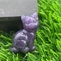 Amethyst hand-carved sitting cat figurine made of natural purple crystal gemstone - Phosphosiderite