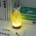 Pineapple-shaped crystal night light with yellow gemstones and solid wood base - Citrine Pineapple Lamp