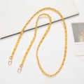 Detail view of woven yellow leather and gold metal chain strap with lobster clasps - Woven Leather Crossbody Style / Yellow