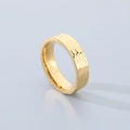 Detail of wide golden titanium ring with hammered texture and polished finish - Gold (6mm)