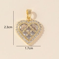 Detailed macro view showing the 2.3cm by 1.7cm dimensions of the gold heart pendant - 0228-12/Gold Simple Pave