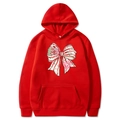 Red Christmas hoodie featuring a festive bow print with tree and dot patterns - Red