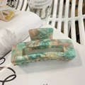 Large acetate hair claw clip with colorful marble pattern and strong square grip design - Multicolor Gradient