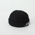 Detail of black cotton kids miki hat featuring white I'm ok smiley face embroidery - 52cm / Black