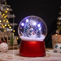 Christmas musical snow globe with snowman and tree inside a red base, 22cm high - Snowing Globe Snowman