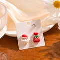 Detail view of asymmetric 925 silver Christmas earrings with Santa and gift bag - Santa Claus and Gift Bag (E3617-1)