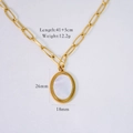 Macro shot of gold paperclip chain necklace with white shell oval pendant and measurements - Oval White Mother of Pearl Beaded Edge Pendant (XB2406007-9)