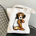 White canvas tote bag featuring a cartoon Beagle dog yoga print with I Love Mom tattoo - I Love Mom Tattoo Dog