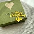 Detail of green embossed gift box with Merry Christmas decoration and heart design - Gold / Large / Plus Thick Style