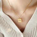Golden square pendant necklace featuring radiant texture and a small zircon heart design - 40+5cm / Gold White Zircon Necklace