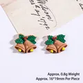 Brown Christmas bell resin charm with holly leaves, measuring 16x19mm for DIY crafts - Bell Style 1