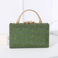 Elegant green rhinestone evening handbag with gold bamboo handle and clasp closure - Green
