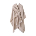Beige cashmere blend shawl poncho with fringe tassels and front knot detail on white background - Beige