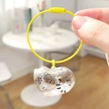 Clear cat hair storage capsule pendant with yellow wire ring and painted sleeping cat detail - New Box - Tabby Cat