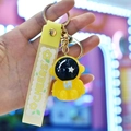 Yellow astronaut keychain with flexible silicone strap and golden metal ring fastener - Light-up Astronaut [Lemon Yellow]