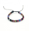 Detail of colorful handmade woven bohemian bracelet with adjustable sliding knot closure - US 9