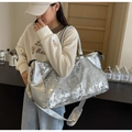 Large capacity sequin travel bag with shoulder strap, stylish sparkly weekender duffel for women. - Silver