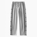 Pantalón deportivo gris claro con cordón, rayas negras y botones de presión lateral - S / Gris claro