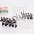 Set of 4 silver stainless steel pants hangers with adjustable non-slip black clips - Small Hard Bead / Black