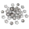Close-up of 8mm silver hollow flower bead caps for DIY jewelry making accessories - 8mm-200Pcs Per Bag / White K/Silver
