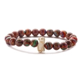 Colorful striped agate bead bracelet with a white penguin charm on a plain background - Red Peacock Ore