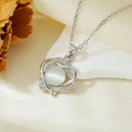 Macro shot of silver heart pendant with cat eye stone and zircons on silk background - Silver Double Hollow Heart Necklace (T021)