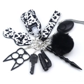 10-piece safety keychain set for women featuring cow print wristlet and various tools - Cow Print