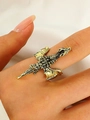 Vintage bronze dragon ring with detailed wings and scales shown on a hand - Antique Bronze Ring (S143)