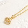 Vergoldete Halskette mit Herz- und Sternanhänger und weißen Zirkonia an einer Kette - Sternenherz / 14K Gold