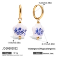 Golden stainless steel hoop earrings with blue flower pendant and waterproof finish - Blue and White Small Flower