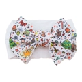 White nylon baby headband with a large Christmas print bow featuring gingerbread men - #26 Christmas Deer