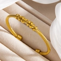 Golden twisted cable bangle with six sliding metallic beads in minimalist open style - Gold