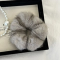 Plush grey fur scrunchie presented in a black gift box with pearls and a card - Gray