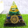 Pyramid-shaped Orgone energy generator with green and blue crystal stones on grass - XQK14 Multi-layer Crystal Pillar