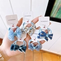 Detail showing five blue bow hair scrunchies with floral and striped fabric patterns - 5 Pairs Set / Blue
