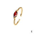 Twisted gold ring with marquise-cut red zircon and beaded texture detail - Garnet Red Marquise / Adjustable Open