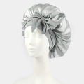 Macro detail of silver satin sleep cap featuring a smooth texture and large bow decoration - One Size / Gray
